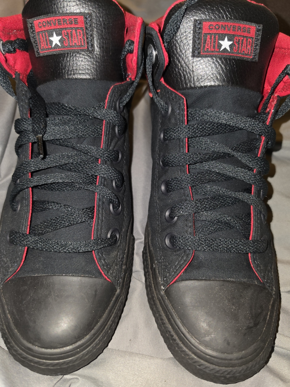 Converse Men’s High-Top Sneakers in Black with Red Trim
